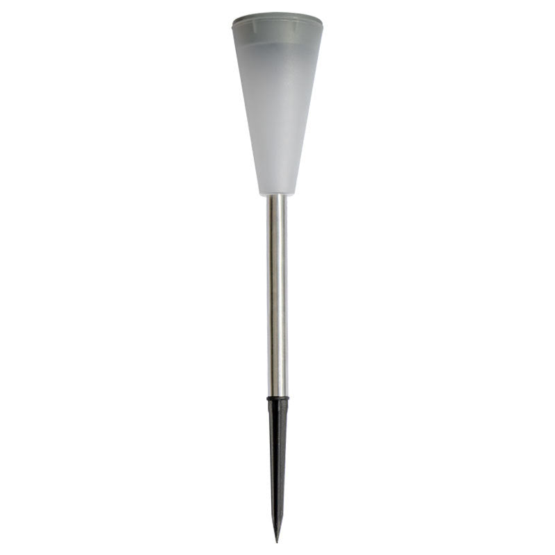 Solar stake light in garden border at night