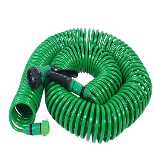 Green coil garden hose with spray gun set