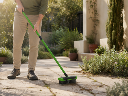 Long-handle wire weed brush cleaning patio joints